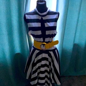 Black and white stripe dress, open in the front, wide bottom